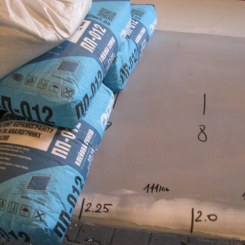 A roll of blue paper on top of a table.