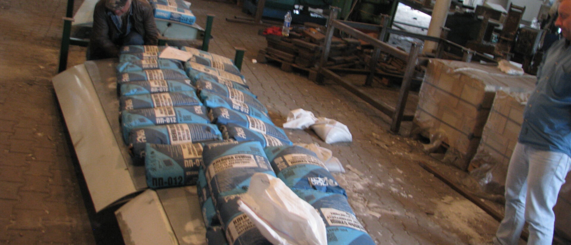 A room filled with lots of bags and boxes.